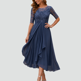 Abito midi in pizzo con gonna in tulle