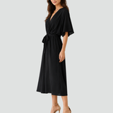 Abito midi elegante con scollo incrociato e cintura