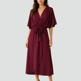 Abito midi elegante con scollo incrociato e cintura